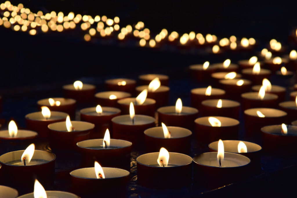 candles burning in memorial for Holocaust victims