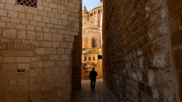 man walking in The Old City, Jerusalem, Israel
