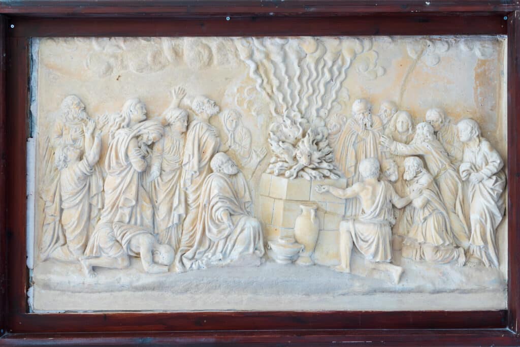 Muhraka monastery of the Carmelite on the Carmel mount . Bas-relief depicting the priests of Baal at the altar and prophet Elijah