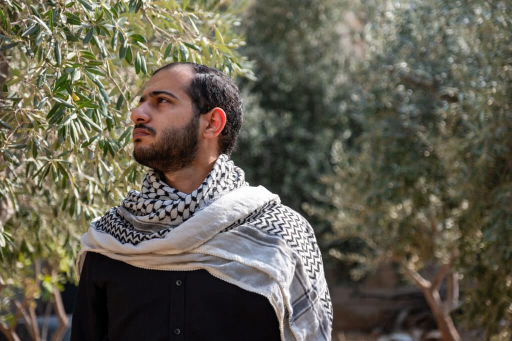 Palestinian man wearing a keffiyeh