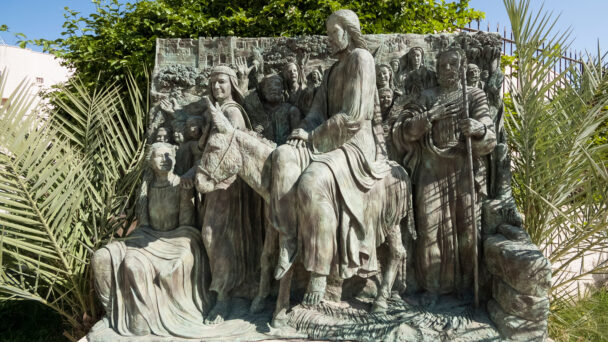 A statue of Jesus on a donkey on Palm Sunday
