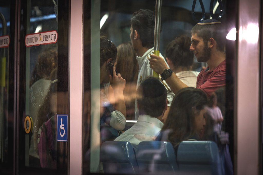 a packed lightrail in jerusalem