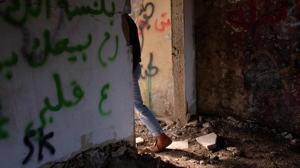 walking through an abandoned syrian base