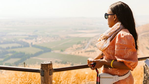 lady looking over the golan